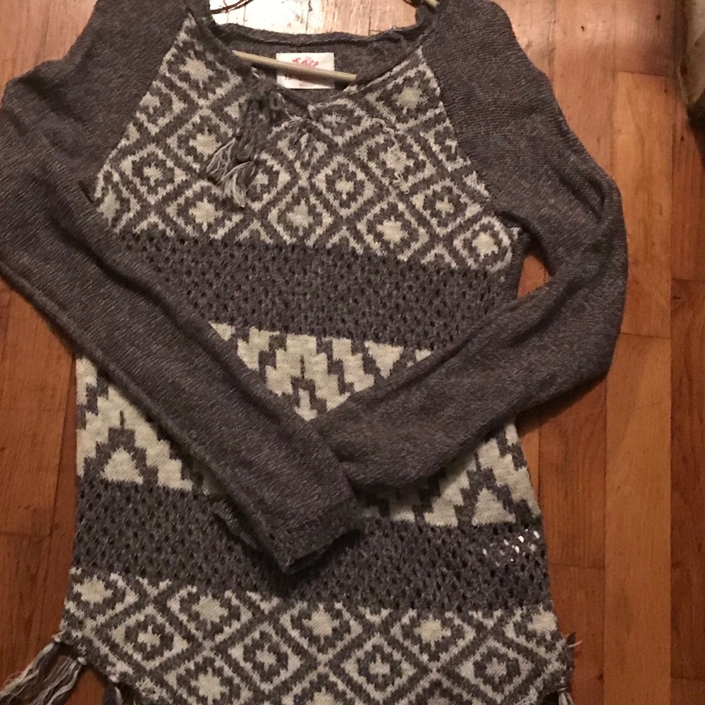 Justice string sweater